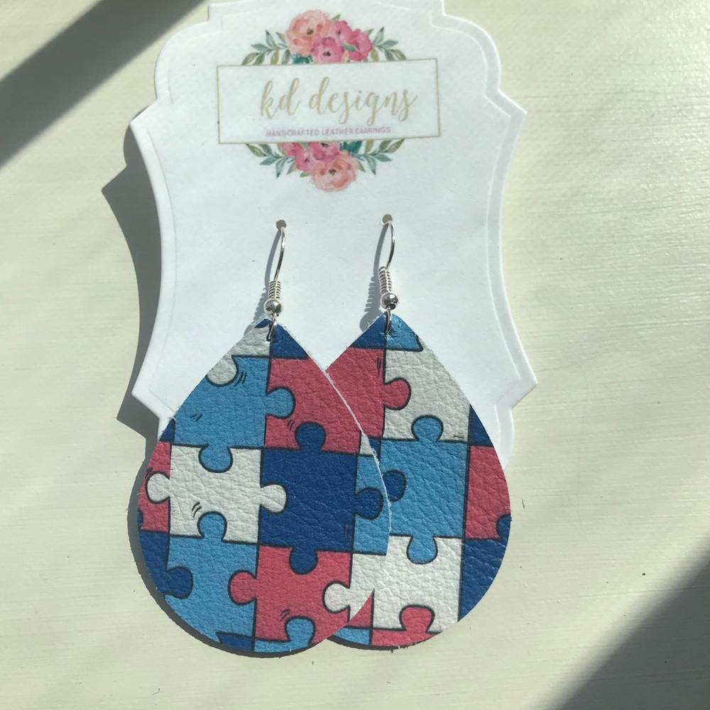 Red/white/blue puzzle piece leather earrings